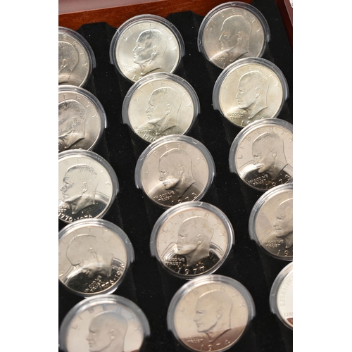 280 - A GLAZED DISPLAY OF THIRTY COMPLETE EISENHOWER DOLLAR COINS 1976-1990, a glazed display of 35 Bejami... 