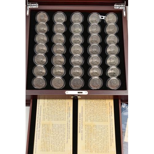 280 - A GLAZED DISPLAY OF THIRTY COMPLETE EISENHOWER DOLLAR COINS 1976-1990, a glazed display of 35 Bejami... 