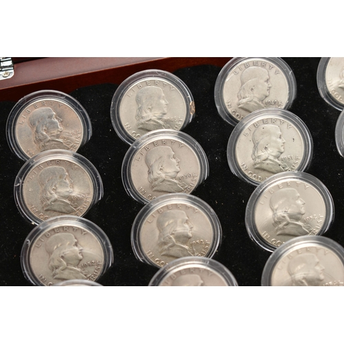 280 - A GLAZED DISPLAY OF THIRTY COMPLETE EISENHOWER DOLLAR COINS 1976-1990, a glazed display of 35 Bejami... 