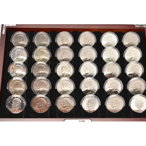 280 - A GLAZED DISPLAY OF THIRTY COMPLETE EISENHOWER DOLLAR COINS 1976-1990, a glazed display of 35 Bejami... 