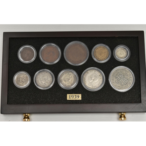 281 - A GLAZED DISPLAY OF EDWARD VII COINS, to include Halfcrown to Farthing circulated coinage with three... 