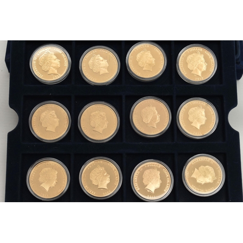 285 - A WESTMINSTER BOXED DISPLAY OF GOLD LAYERED COINS, to include 36x Cook Islands Dollar coins 1969-200... 