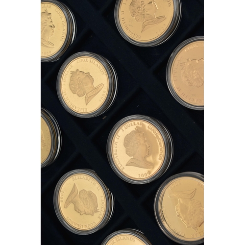 285 - A WESTMINSTER BOXED DISPLAY OF GOLD LAYERED COINS, to include 36x Cook Islands Dollar coins 1969-200... 