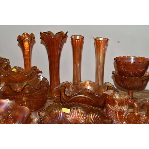 344 - A LARGE QUANTITY OF CARNIVAL GLASSWARE, traditional orange colour, comprising a preserve pot, three ... 