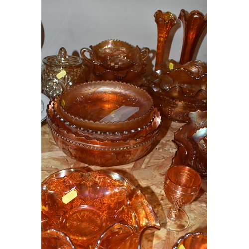 344 - A LARGE QUANTITY OF CARNIVAL GLASSWARE, traditional orange colour, comprising a preserve pot, three ... 