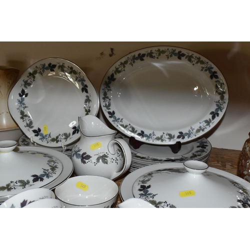 345 - A ROYAL DOULTON 'BURGUNDY' PATTERN DINNER SET, comprising two circular covered tureens (one has a re... 