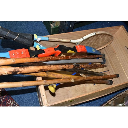 352 - THREE BOXES OF ASSORTED SUNDRIES, to include walking sticks, vintage badminton racquets, chess set, ... 