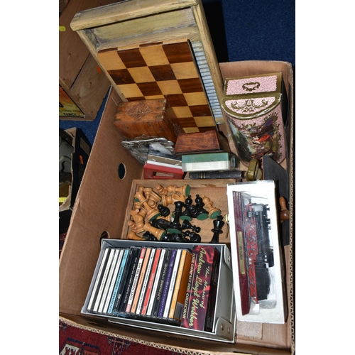 352 - THREE BOXES OF ASSORTED SUNDRIES, to include walking sticks, vintage badminton racquets, chess set, ... 