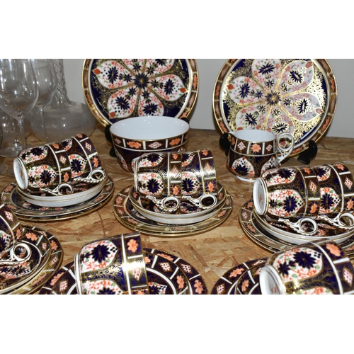 356 - A FORTY PIECE ROYAL CROWN DERBY IMARI 1128 PART TEA SET, comprising two large dished plates, a cream... 