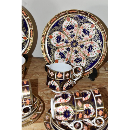 356 - A FORTY PIECE ROYAL CROWN DERBY IMARI 1128 PART TEA SET, comprising two large dished plates, a cream... 