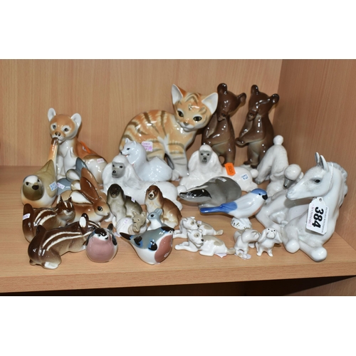 384 - A COLLECTION OF LOMONOSOV AND OTHER RUSSIAN PORCELAIN ANIMALS, twenty eight pieces to include a foal... 