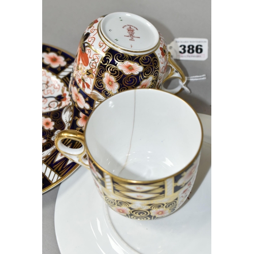 386 - TWO ROYAL CROWN DERBY IMARI 2451 TRIOS, comprising two teacups, two saucers, and two 18cm tea plates... 