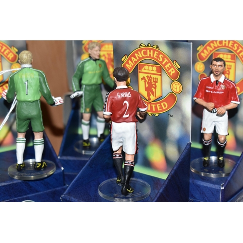 414 - FOUR BOXED CORGI ICON MANCHESTER UNITED FC DIECAST FIGURES, comprising Gary Neville, Roy Keane, and ... 