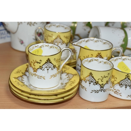 419 - A COLLECTION OF COFFEE WARE, comprising a Coalport cabinet Demitasse yellow and white 5879 pattern c... 