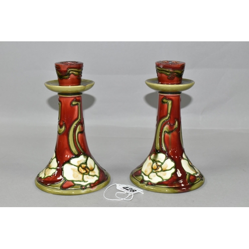 428 - A PAIR OF MINTON No.1 SECESSIONIST ART NOUVEAU CANDLE STICKS, green tube lined decoration of cream s... 