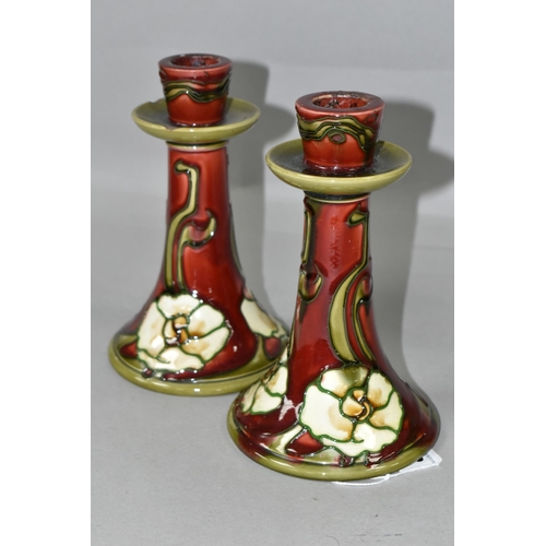 428 - A PAIR OF MINTON No.1 SECESSIONIST ART NOUVEAU CANDLE STICKS, green tube lined decoration of cream s... 