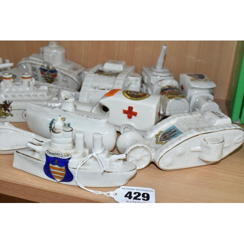 429 - A GROUP OF ASSORTED CRESTED WARE MILITARY WW1 VEHICLES, comprising a Carlton china submarine  with a... 