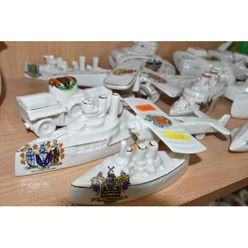 429 - A GROUP OF ASSORTED CRESTED WARE MILITARY WW1 VEHICLES, comprising a Carlton china submarine  with a... 