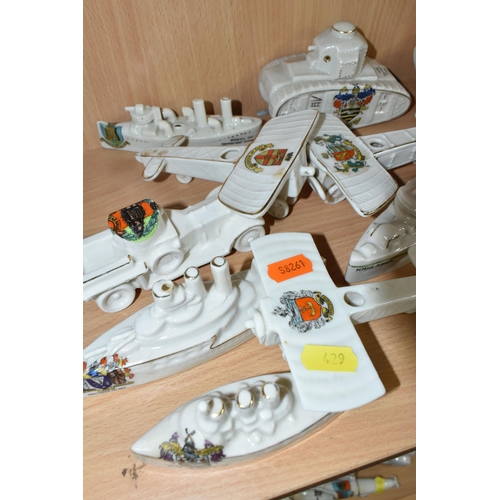 429 - A GROUP OF ASSORTED CRESTED WARE MILITARY WW1 VEHICLES, comprising a Carlton china submarine  with a... 