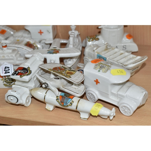 434 - SIXTEEN ASSORTED CRESTED WARE WW1 MILITARY VEHICLES, comprising a Carlton china vintage bus with a T... 