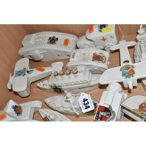 434 - SIXTEEN ASSORTED CRESTED WARE WW1 MILITARY VEHICLES, comprising a Carlton china vintage bus with a T... 