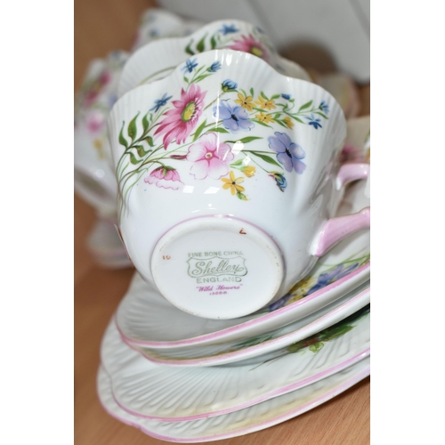 438 - A SHELLEY 'WILD FLOWERS' 13668 PATTERN TEA SET, pale pink handles and edges, comprising six cups, si... 