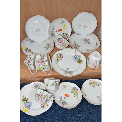 438 - A SHELLEY 'WILD FLOWERS' 13668 PATTERN TEA SET, pale pink handles and edges, comprising six cups, si... 