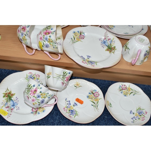 438 - A SHELLEY 'WILD FLOWERS' 13668 PATTERN TEA SET, pale pink handles and edges, comprising six cups, si... 