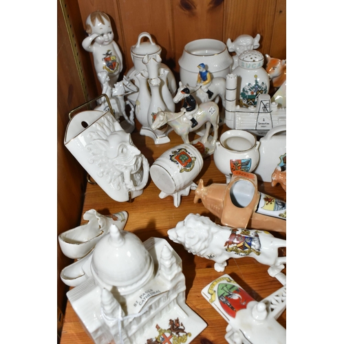 444 - A LARGE QUANTITY OF CRESTED WARE, comprising a W.H. Goss St Paul's Cathedral with a City Of London c... 