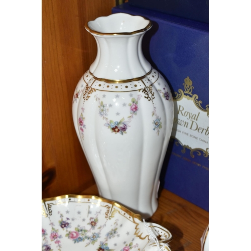 448 - A GROUP OF ROYAL CROWN DERBY PORCELAIN, comprising a boxed 'Royal Antoinette' tray silver No.1 trink... 