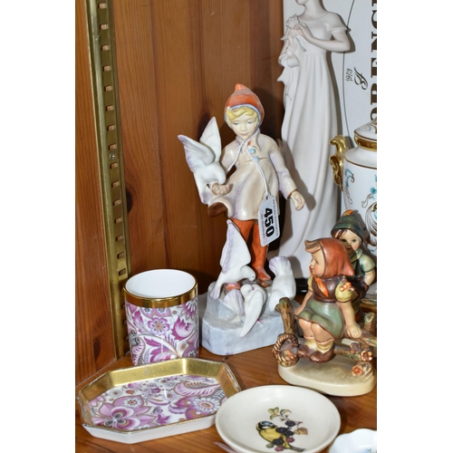 450 - A GROUP OF CERAMIC ORNAMENTS, comprising a Llado 4824  'Golfer' figure (missing golf club), a boxed ... 