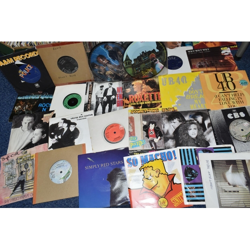 473 - A BOX OF VINYL SINGLES, over three hundred records, artists to include Elvis Presley, Pet Shop Boys,... 