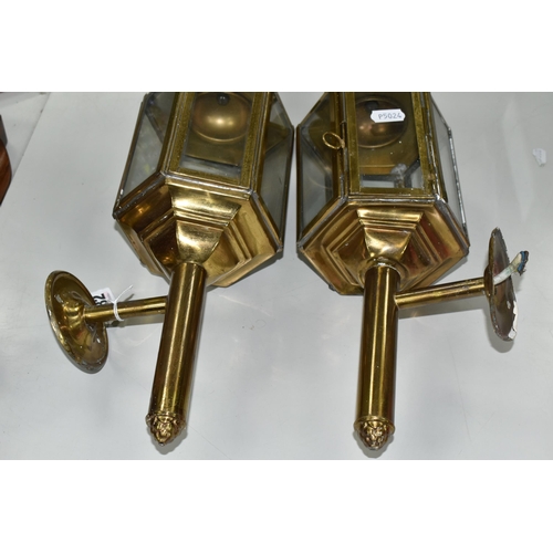 482 - A PAIR OF BRASS ELECTRIC WALL LIGHTS, in the style of Victorian coach/carriage lanterns with brass e... 