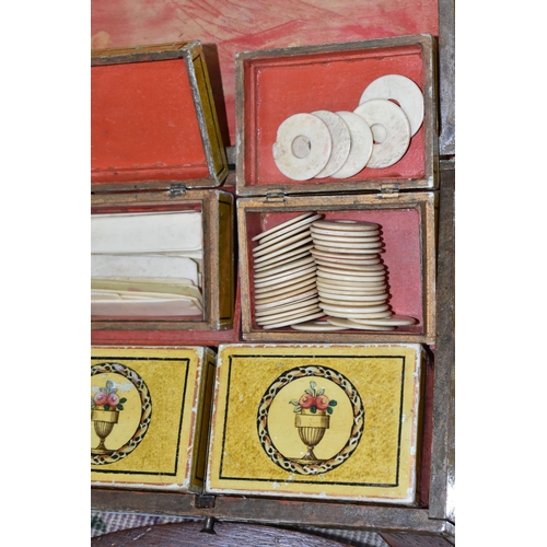 492 - A BOX CONTAINING NINETEENTH CENTURY NEEDLEWORK AND A GEORGIAN GAME BOX, comprising a wooden framed p... 