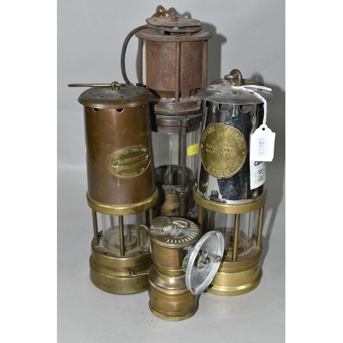 493 - FOUR ASSORTED LAMPS, comprising The Projector Lamp and Lighting Co Ltd type SL safety lamp, another ... 