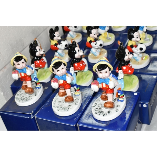 512 - FIFTEEN BOXED KENLEYS LTD. WALT DISNEY'S PORCELAIN FIGURES, comprising three 'Pinocchio Going To Sch... 