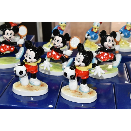 558 - SIXTEEN BOXED KENLEYS LTD. WALT DISNEY'S PORCELAIN FIGURES, comprising two 'Pinocchio Going To Schoo... 