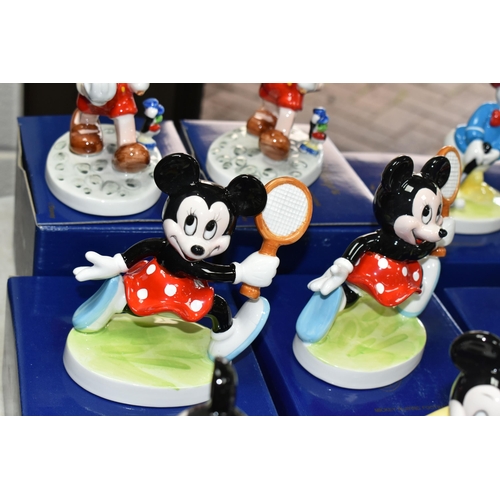 558 - SIXTEEN BOXED KENLEYS LTD. WALT DISNEY'S PORCELAIN FIGURES, comprising two 'Pinocchio Going To Schoo... 