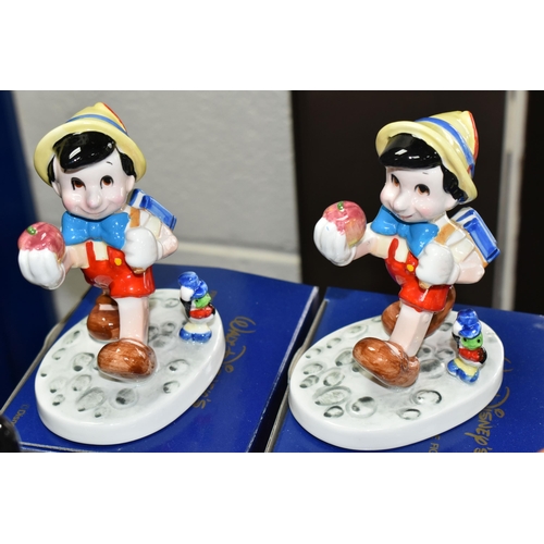 558 - SIXTEEN BOXED KENLEYS LTD. WALT DISNEY'S PORCELAIN FIGURES, comprising two 'Pinocchio Going To Schoo... 