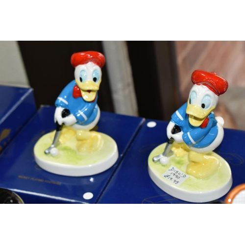 558 - SIXTEEN BOXED KENLEYS LTD. WALT DISNEY'S PORCELAIN FIGURES, comprising two 'Pinocchio Going To Schoo... 