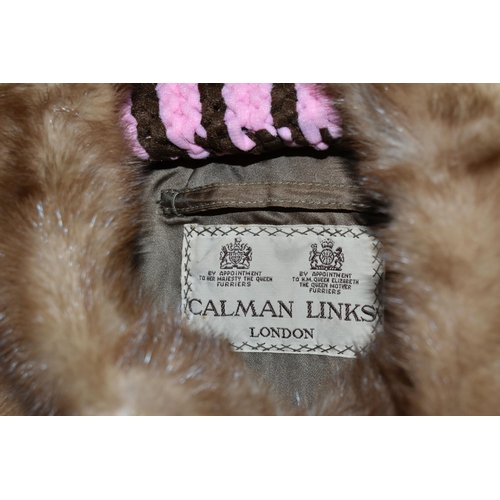 563 - THREE LADIES FUR COATS, comprising a Calman Links short fur jacket, a Jules Van-Hove Ltd. brown fur ... 