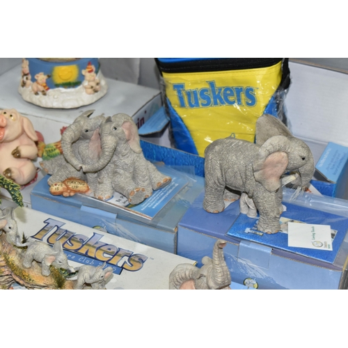 572 - A LARGE QUANTITY OF DAVID CORBRIDGE PIGGIN' FIGURES TOGETHER WITH TEN TUSKERS' ELEPHANT FIGURES, com... 