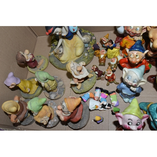 573 - TWO BOXES OF SNOW WHITE AND THE SEVEN DWARF FIGURES, to include four Italian Boccacio decanters, Doc... 