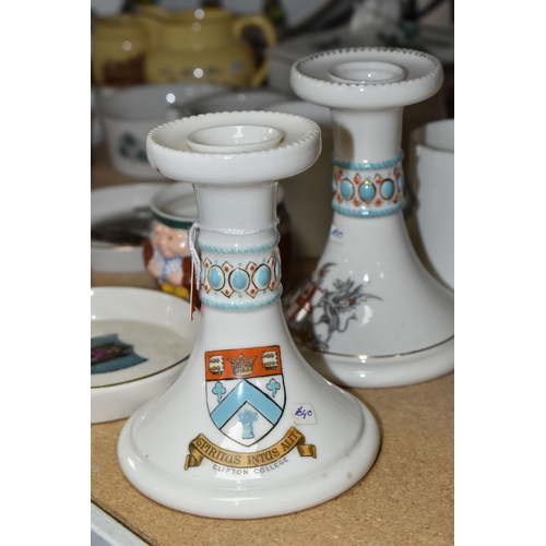 590 - A  QUANTITY OF W.H GOSS GIFTWARE, comprising a crested ware candle stick with a Clifton College cres... 