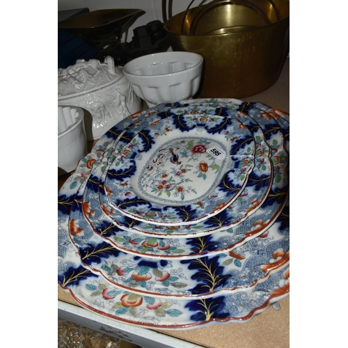 595 - A SET OF FIVE GRADUATED LATE 19TH CENTURY IRONSTONE PLATES, decorated with an exotic bird and floral... 