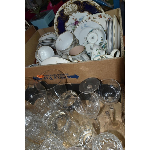 597 - THREE BOXES OF CERAMICS AND GLASSWARE, to include china tea sets, drinking glasses, an Austrian Kera... 