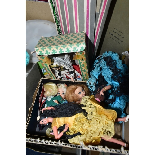 598 - A QUANTITY OF VINTAGE DOLLS AND CLOTHING, to include an Amanda Jane doll and quantity of branded clo... 