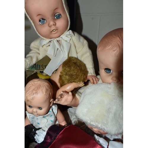 598 - A QUANTITY OF VINTAGE DOLLS AND CLOTHING, to include an Amanda Jane doll and quantity of branded clo... 