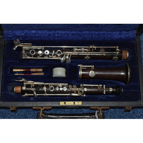 608 - TWO CASED WOODWIND INSTRUMENTS: AN OBOE BY F. LORÉE OF PARIS, AND A CLARINET, the oboe stamped 'F. L... 