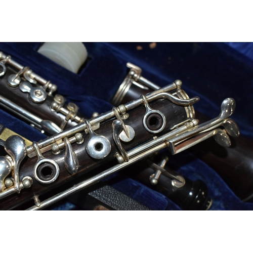 608 - TWO CASED WOODWIND INSTRUMENTS: AN OBOE BY F. LORÉE OF PARIS, AND A CLARINET, the oboe stamped 'F. L... 